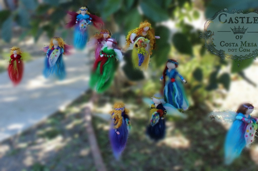 141117 10 completed wool fairy angel doll mobiles hanging in cherimoya tree 2.