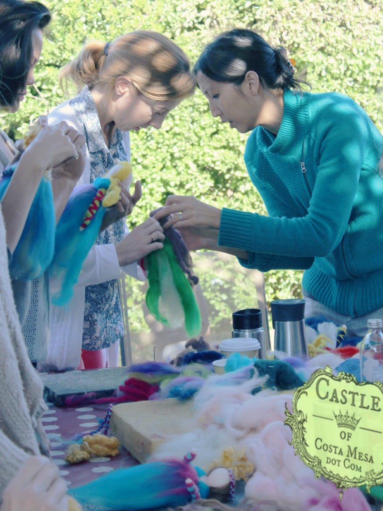 141117 Corinna helping Carolynne attach wool top roving hair on her pulled magic wool angel.