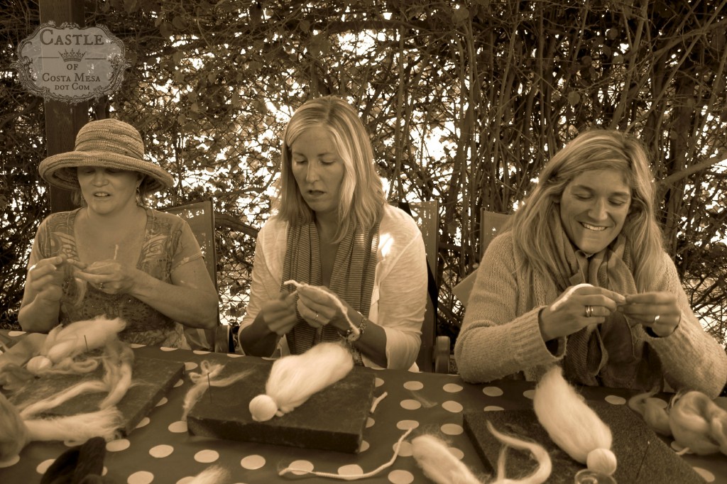 141117 Jenifer, Kathy and Tina in the grove wrapping wool fibers on pipe cleaners.