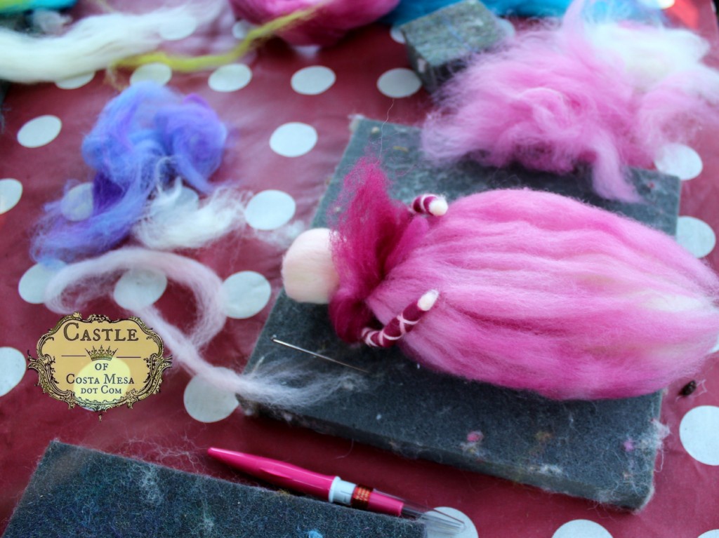 141117 Kim's fluffy pink and maroon pulled wool angel in the process of being made.