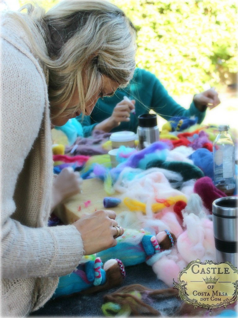 141117 Tina needle-felting flowers into her fairy's cornucopia.