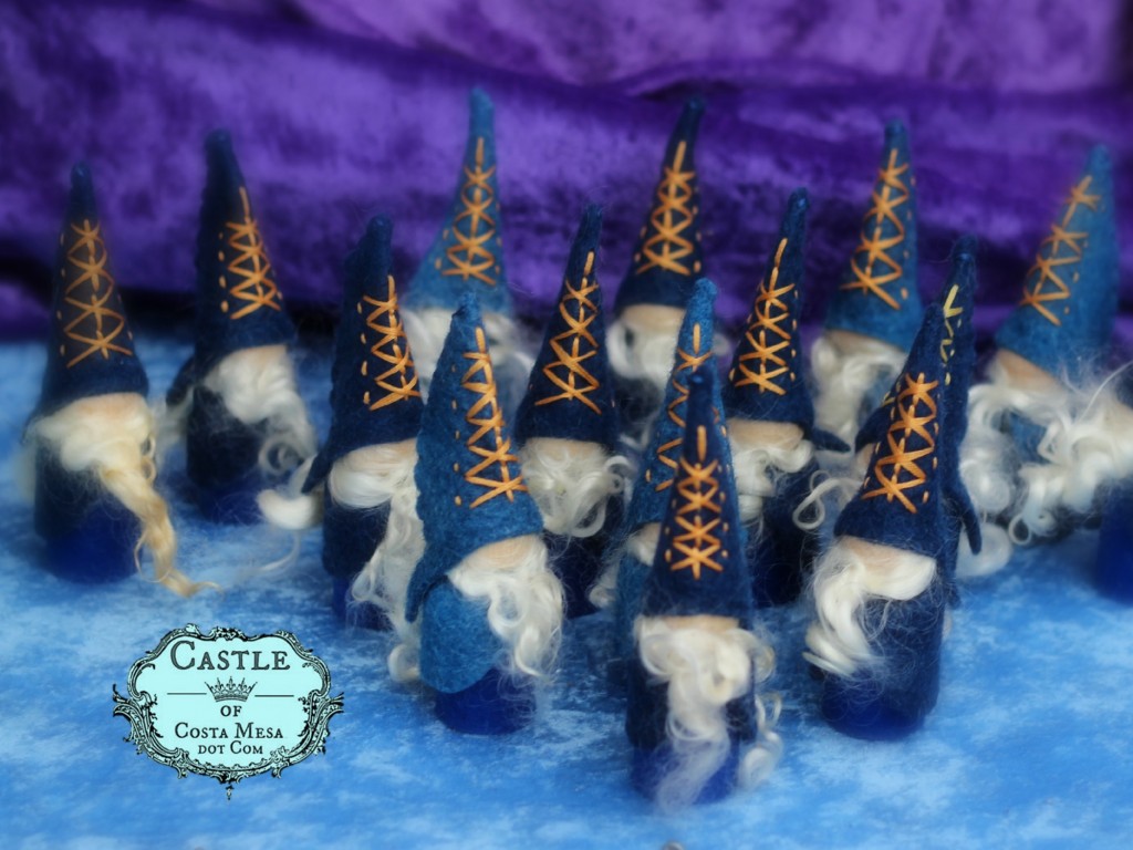 141206 Handmade wooden father winter peg gnomes with wool lock beards and pointy handstitched embellished felt hats.