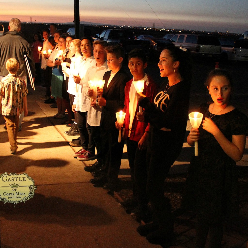 141208 7th Grader choir candlelit procession  singing as Winter Festival closes.