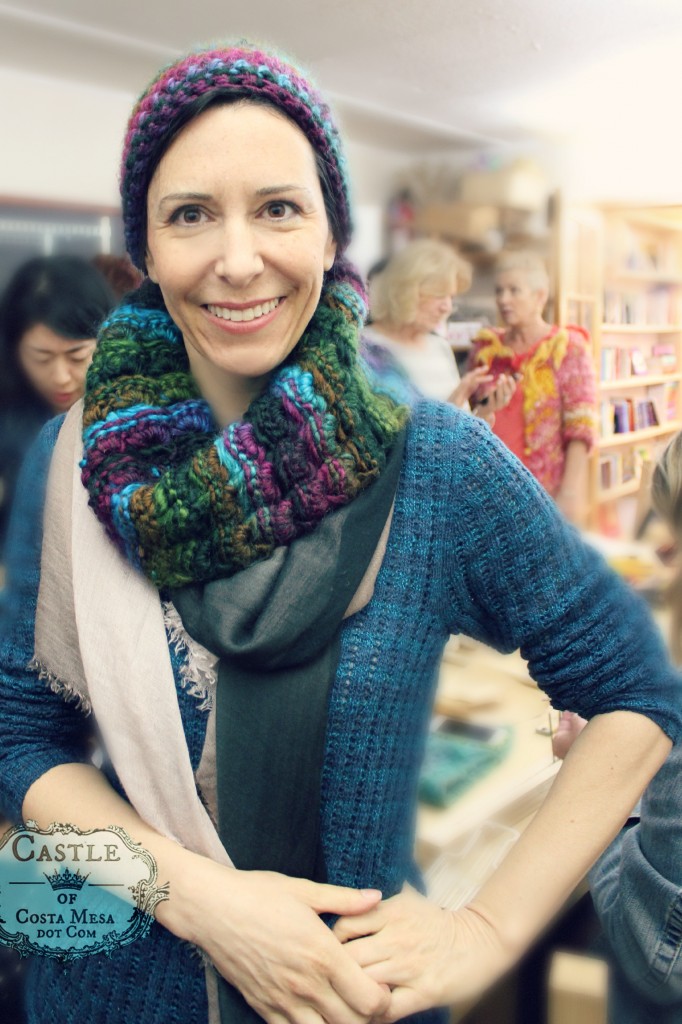 150302 Melissa and her broomstick cowl and beanie hat.