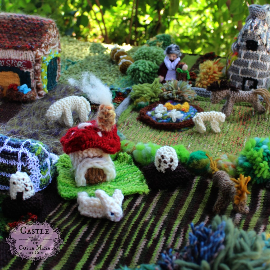 1545 150527 Nunu made knitted crochet toadstool cottage and knitted bunny.