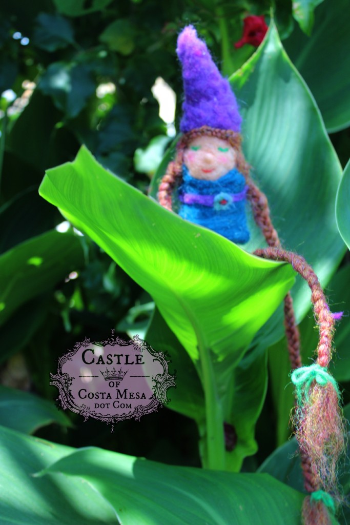1742 150608 Maya's Rapunzel girl gnome with long braids on a leaf logo