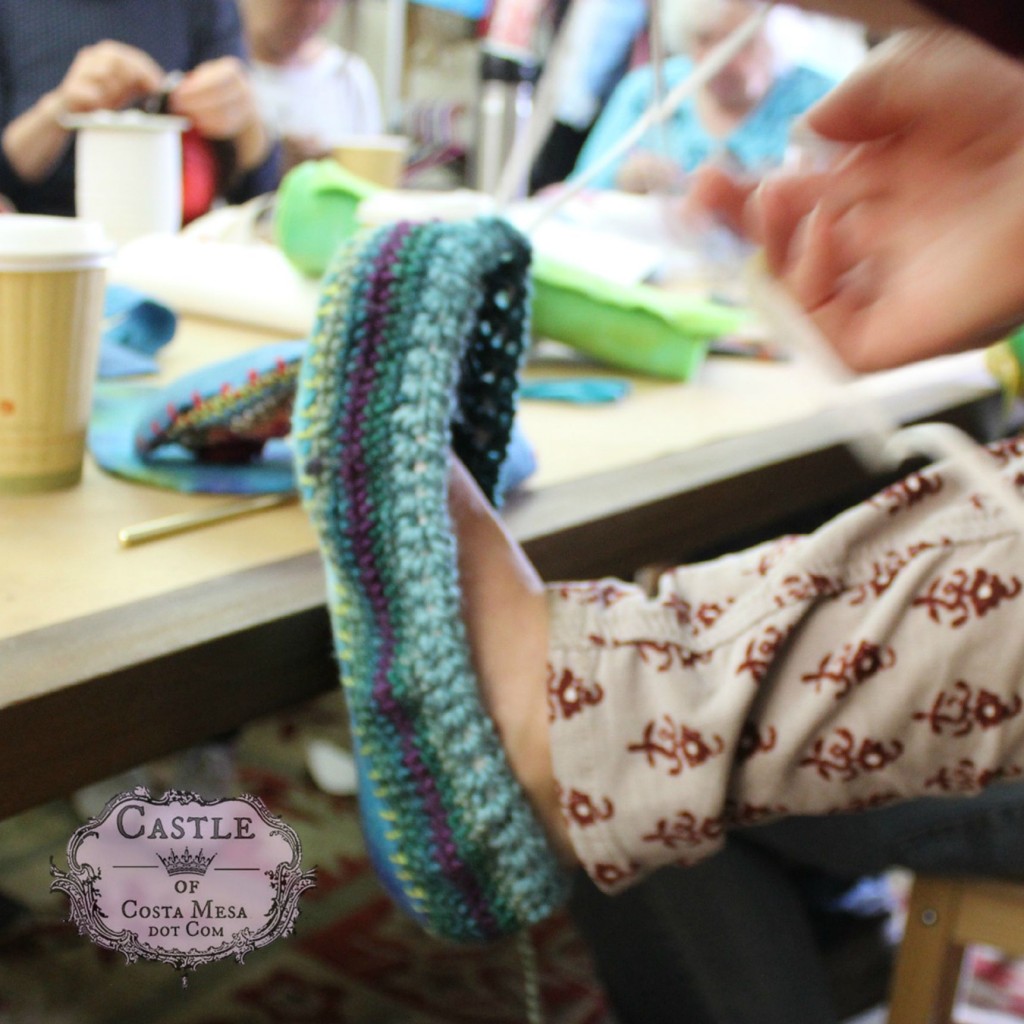 2782 150918 Roxanna threading and fastening elastic band onto crochet slipper opening
