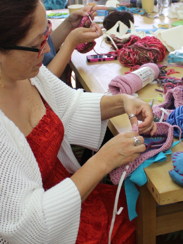 2820 150915 Geraldine threading elastic band into double crochet round at the opening of slipper